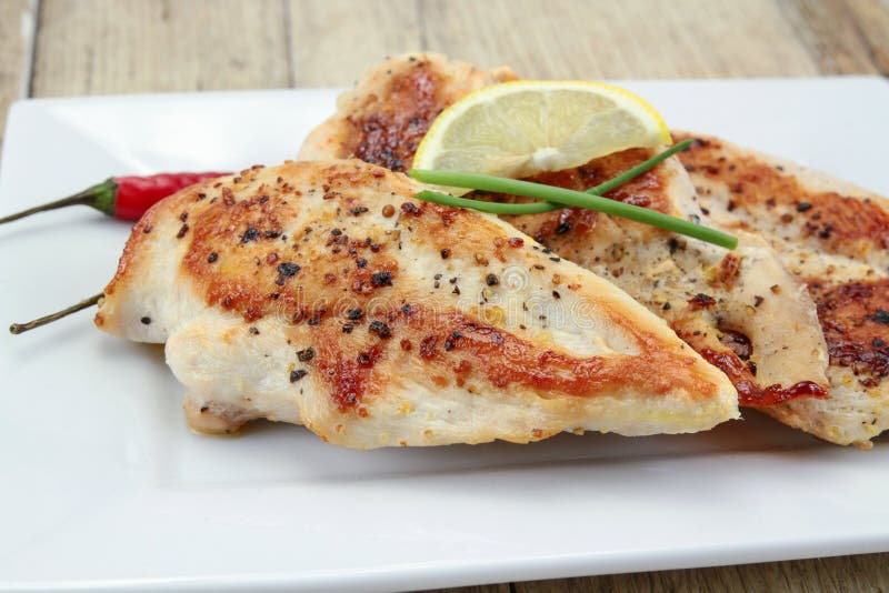 Grilled chicken cutlets stock image. Image of cooked 163962701