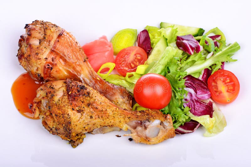 Grilled chicken drumstick with vegetables