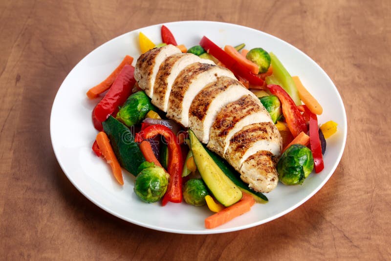 Grilled Chicken Fillet, Breast with Cooked Vegetable on Plates. Stock Image Image of roasted