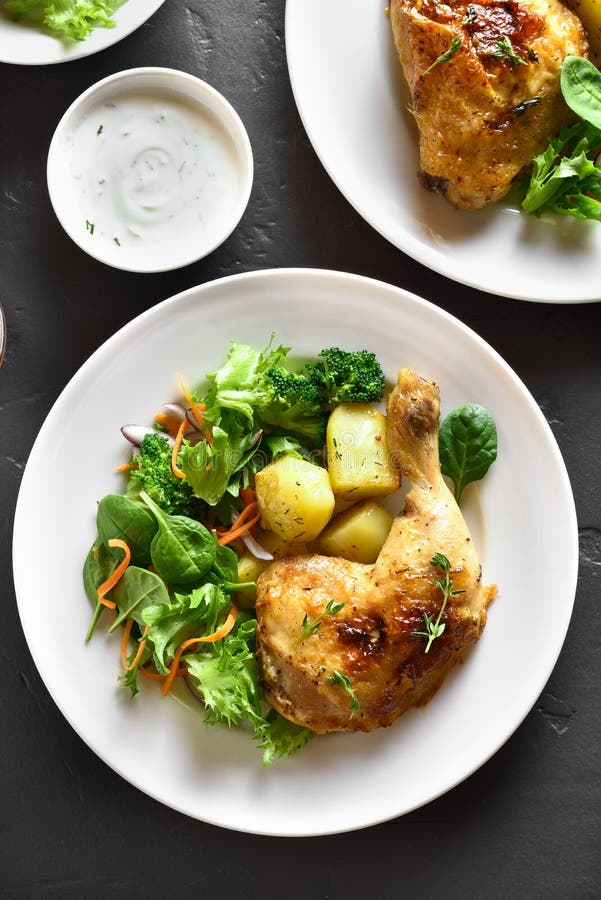 Grilled Chicken Leg with Potato and Green Salad Stock Photo - Image of ...