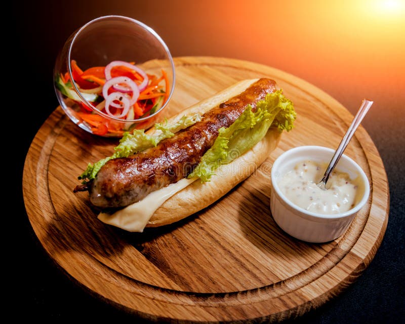 Grilled chicken seekh kebab with fresh bun and cheese.