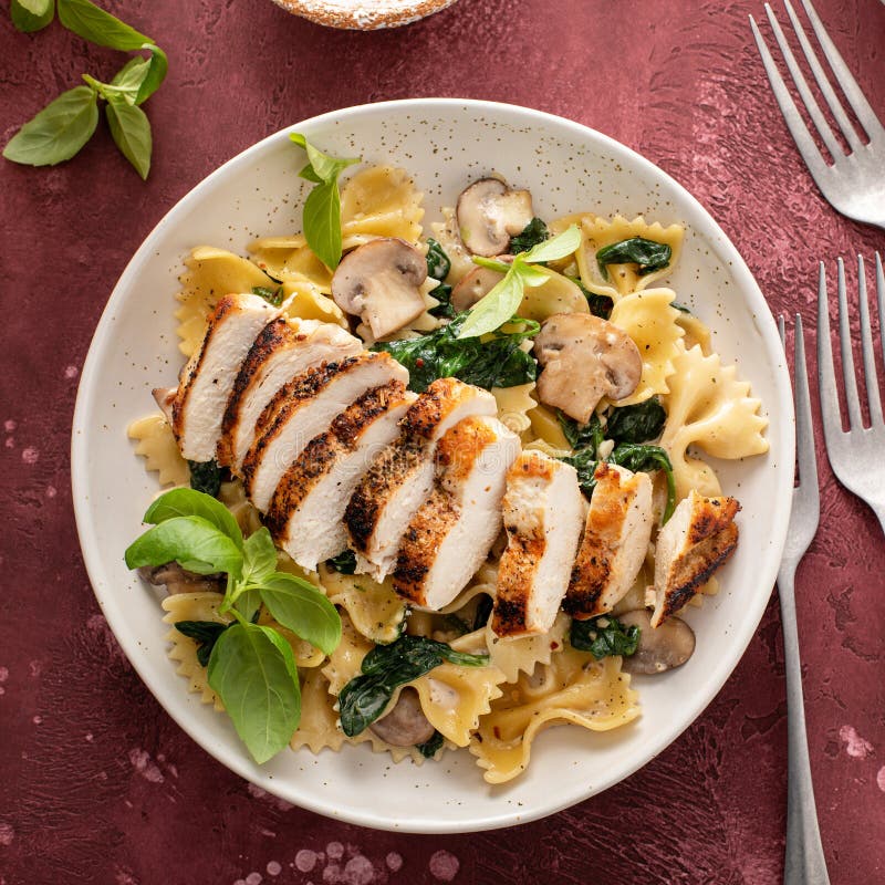 Grilled Chicken with Mushroom and Spinach Pasta Stock Photo - Image of