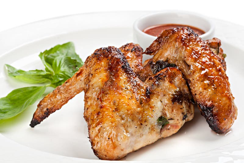 Grilled Chicken Wings with Tomato Sauce. Stock Photo - Image of white ...