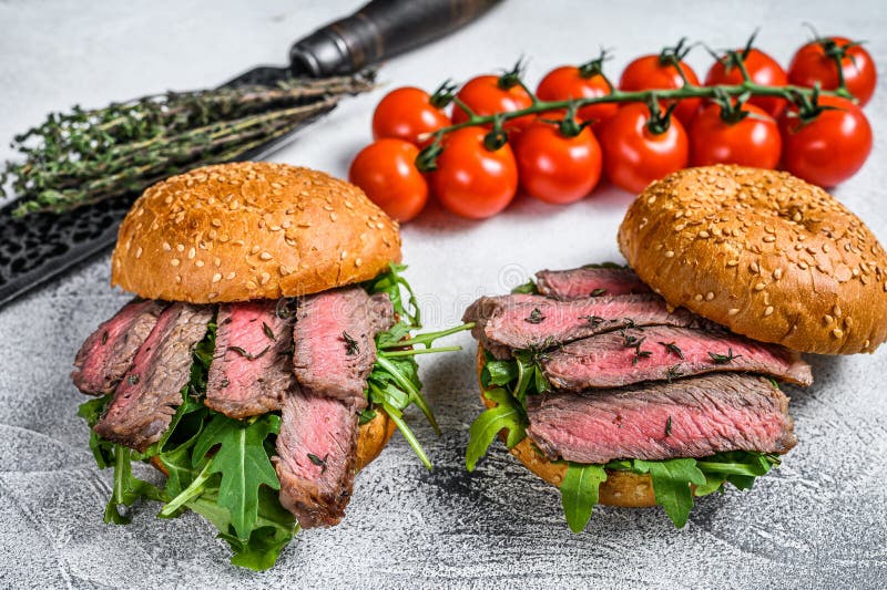 Grilled Cold Cuts Roast Beef Burger Sandwich with Arugula and Spinach