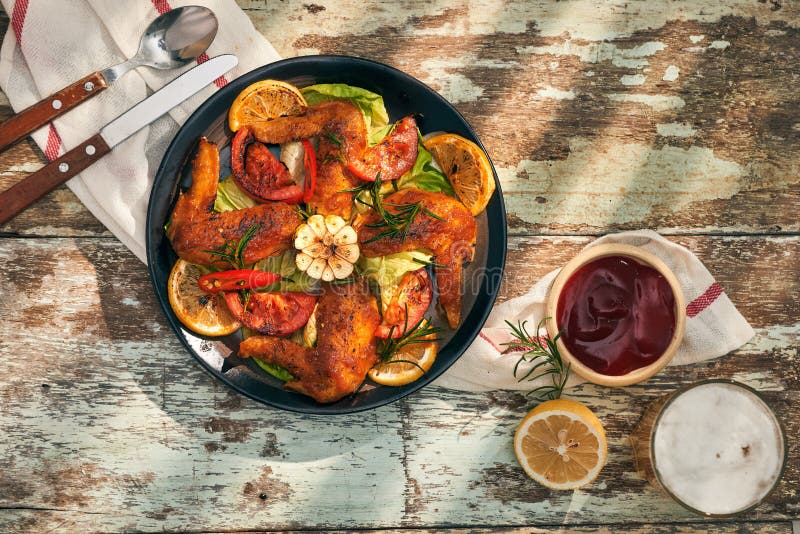 Grilled Drumstick of Chicken in Spicy Marinade with the Addition of