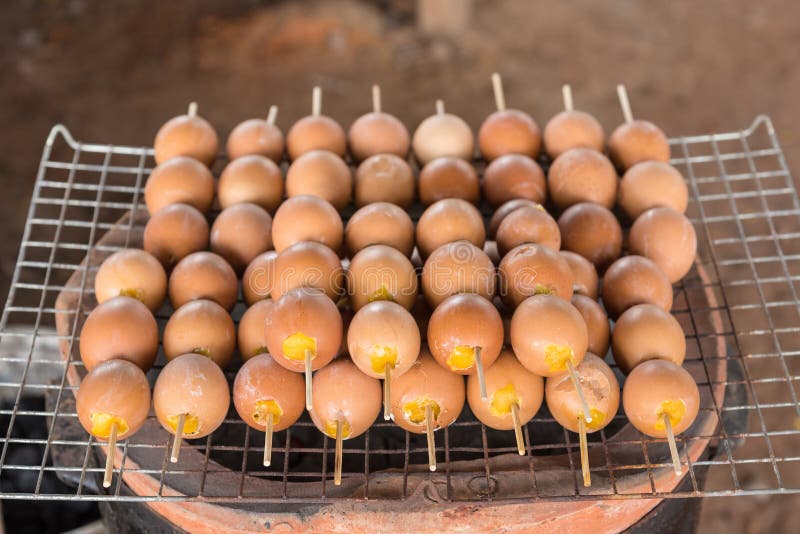 Grilled Egg / Eggs On The Barbecue Grill In Street Market. Stock Photo