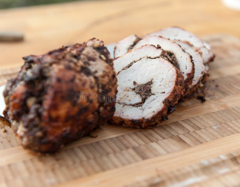 Grilled filled pork loin on a wood plate. Paleo cauliflower stock images, royalty-free photos and pictures