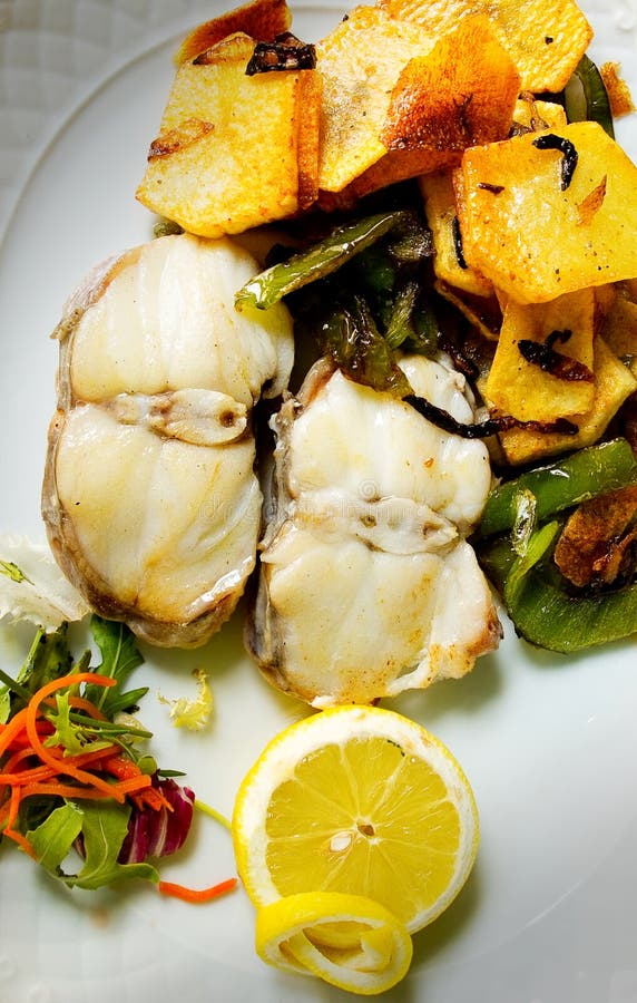 Grilled Hake Fillet in Spices and Decorations on Round Plate on Stock Image Image of