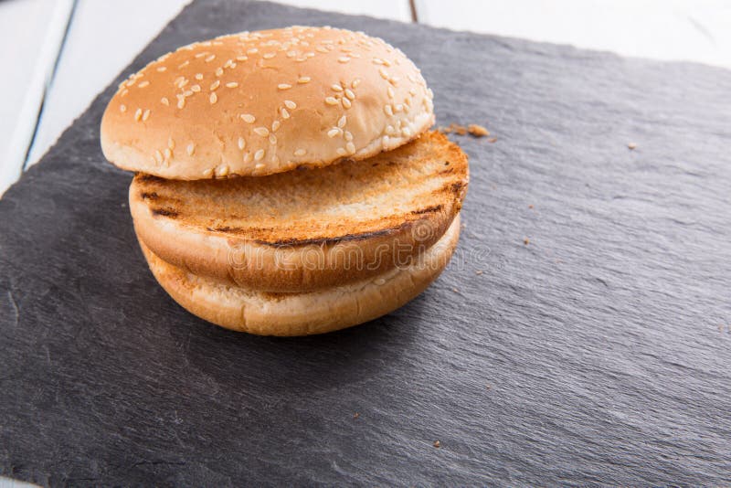 Grilled Hamburger on a Bun stock image. Image of ground 13350889