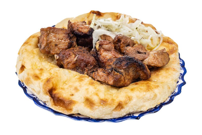 Grilled kebab on flatbread on plate isolated royalty free stock photography