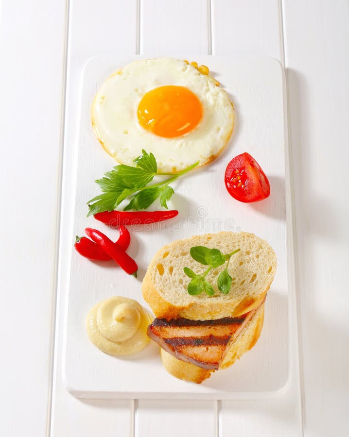 Grilled Leberkase Sandwich with Mustard and Fried Egg Stock Image