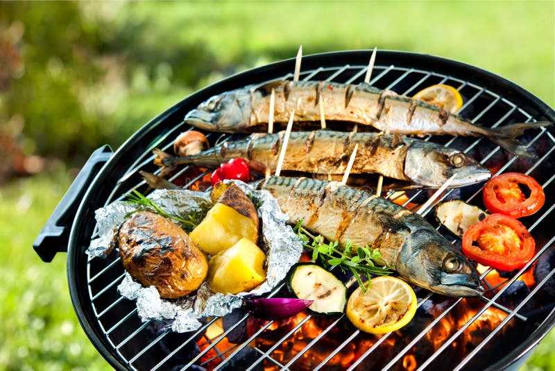 Grilled mackerel fish with baked potatoes