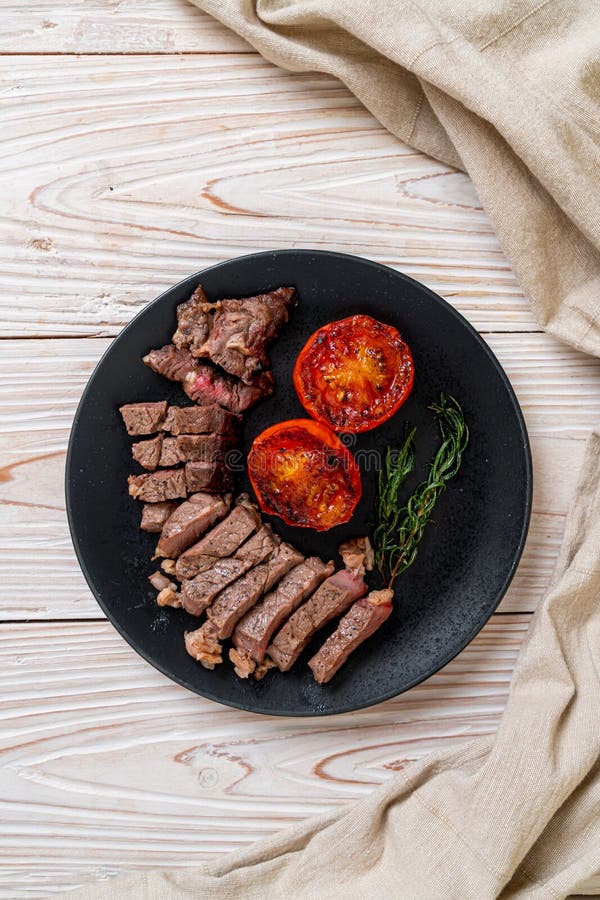 Grilled Medium Rare Beef Steak Stock Photo Image of board, beefsteak