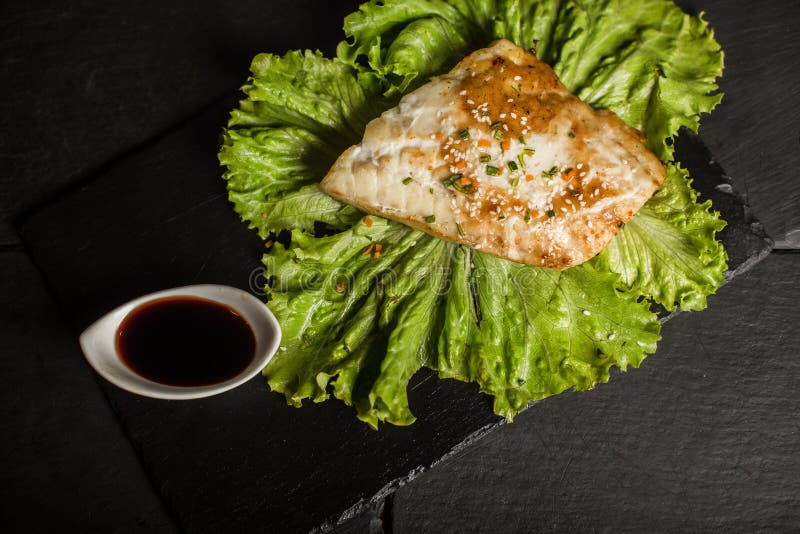 Grilled Pangasius with Sauce. Seafood. Fish Dish. Restaurant Stock