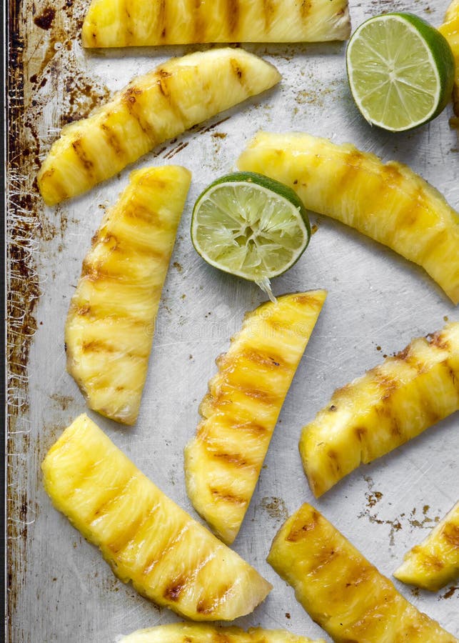 Grilled Pineapple with Lime on Tray, View from Above. Flat Lay