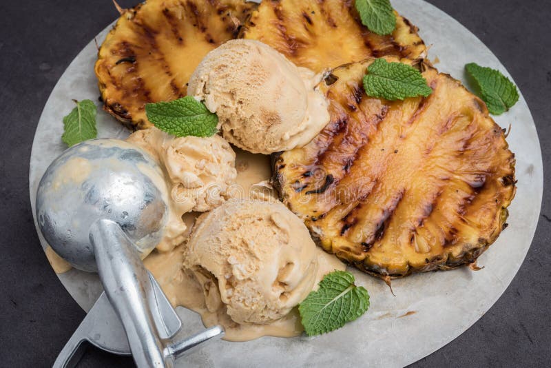 Grilled Pineapple with Vanilla Ice Cream and Mint Leaves Stock Image Image of syrup, food