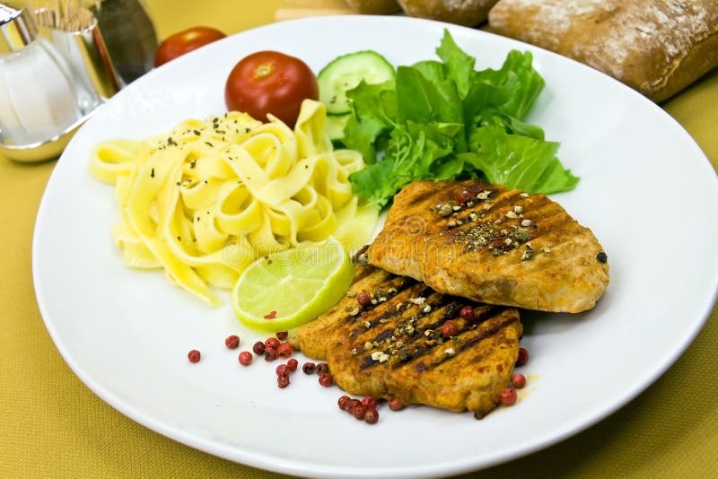 Grilled Pork Steak With Noodles And Lettuce Picture. Image 9052383