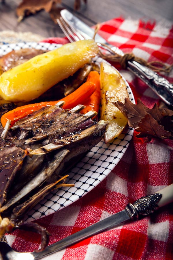 Grilled Rack of Lamb Chops with Potatoes an Vegetables Stock Image
