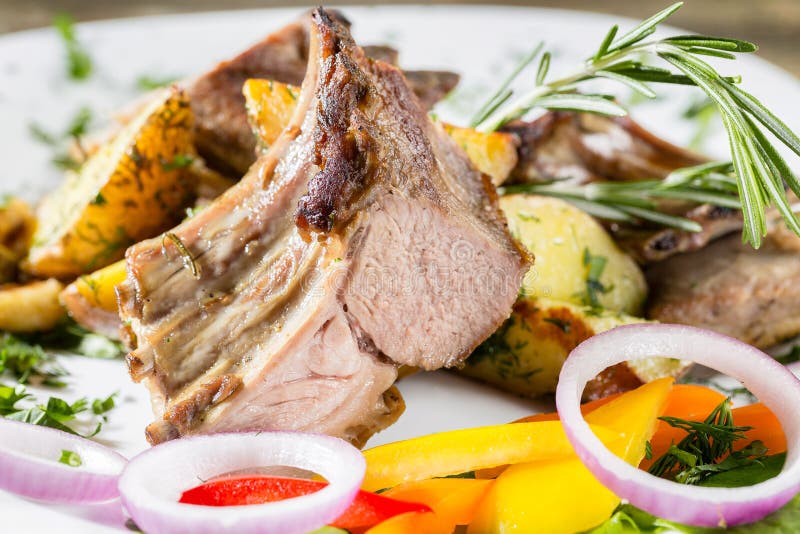 Grilled Rack of Lamb with Fried Potatoes and Fresh Vegetables Stock