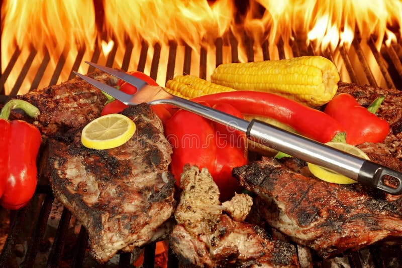 Grilled Rib Steaks and Vegetables on BBQ Grill XXXL