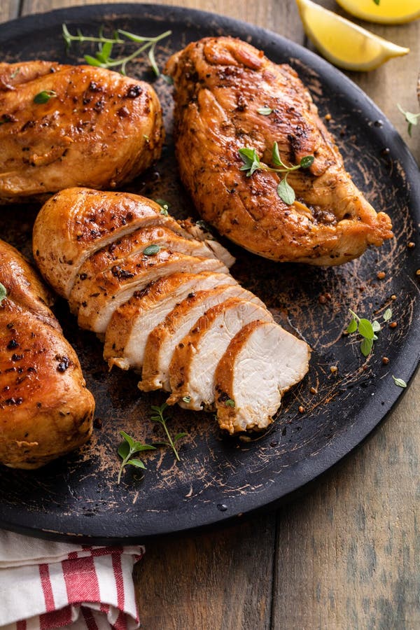 Grilled or Roasted Chicken Breast on a Serving Plate Stock Photo ...