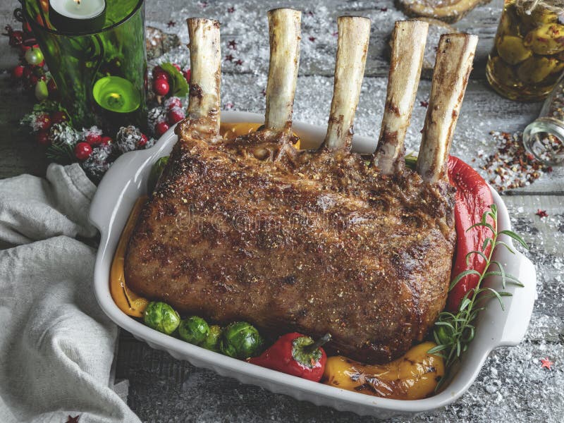 Grilled Roasted Rack of Veal Lamb Chops with Vegetables in Ceramic