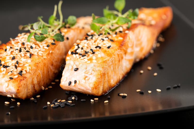 Grilled Salmon on Black Plate Close Up Stock Image - Image of grill ...