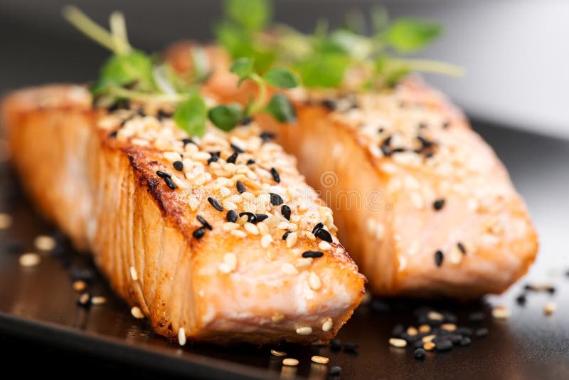 Grilled Salmon on Black Plate Macro Stock Photo - Image of cooked ...