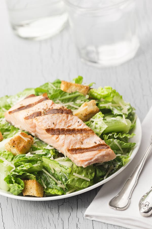 Grilled Salmon Caesar Salad Stock Photo - Image of food, caesar: 53472818