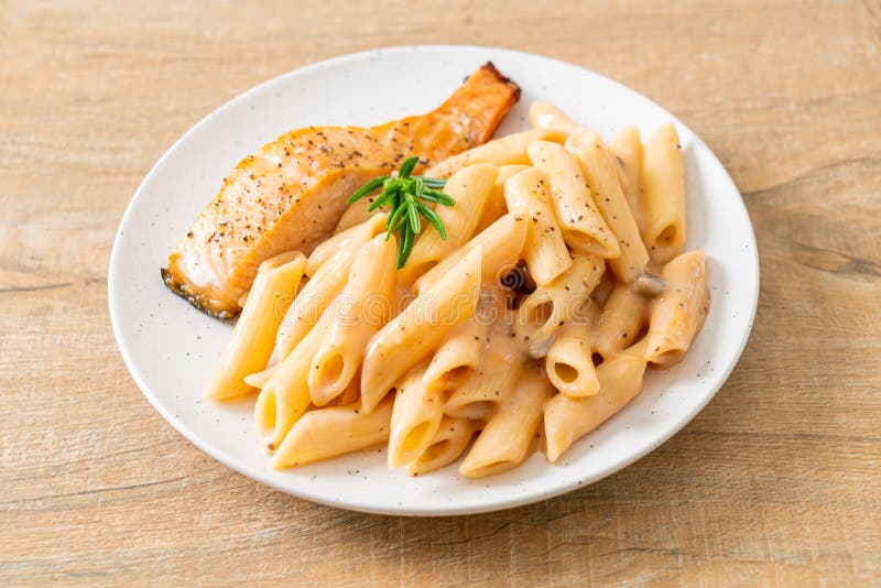 Salmon with Penne Pasta Cream Sauce Stock Photo - Image of lunch ...