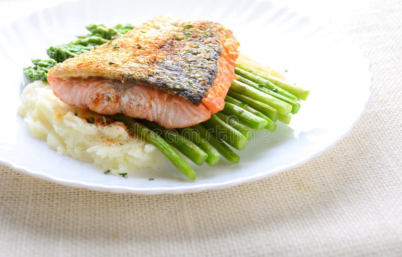 Grilled Salmon Garnished with Asparagus and Herbs and Mashed Potatoes