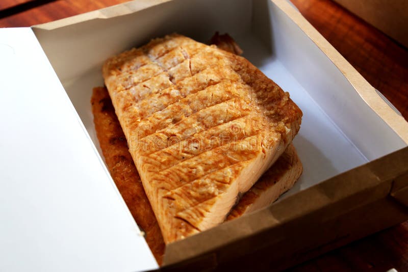 Grilled Salmon on the Grill with Grill Marks. Delivery Restaurant Stock