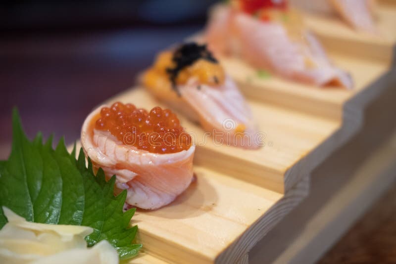 Grilled Salmon Sushi Roll and Salmon Eggs Stock Image Image of luxury