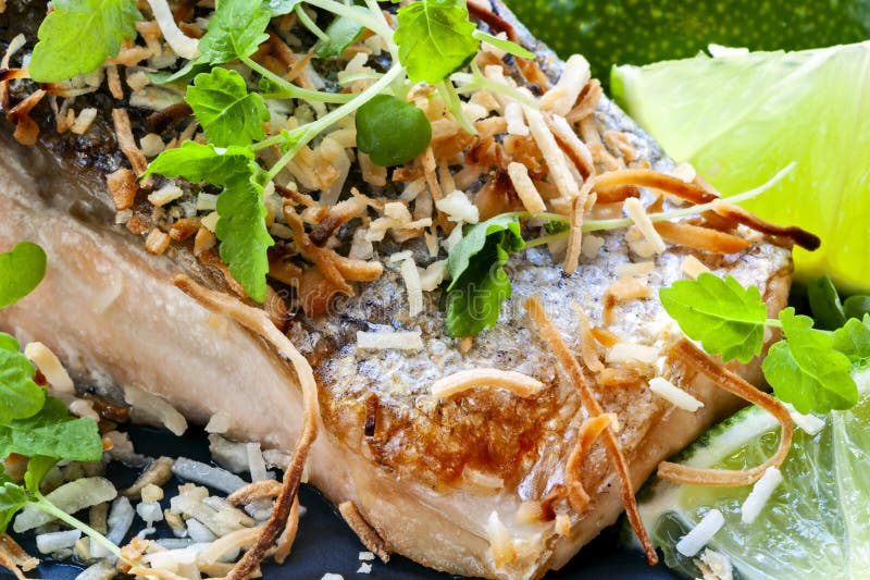 Grilled Salmon with Toasted Coconut Lime and Micro Herbs Stock Photo