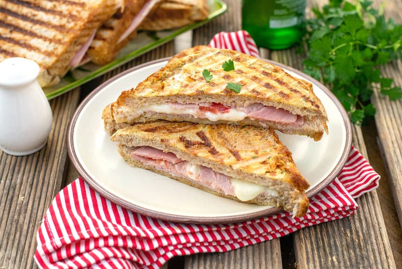 Grilled Sandwich with Ham, Mozzarella Cheese and Tomato Stock Photo