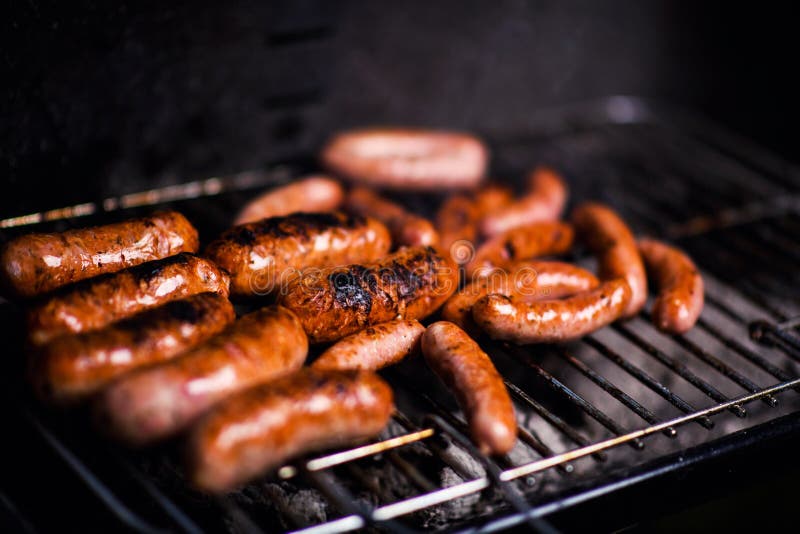 Grilled Sausage on the Flaming Grill Stock Photo Image of smoke, meal