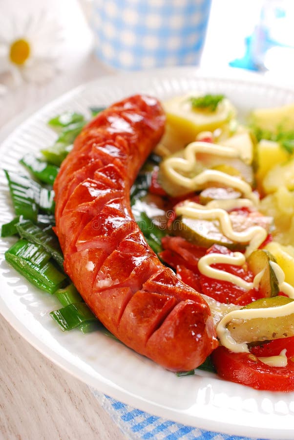 Grilled sausage,vegetable salad and potato