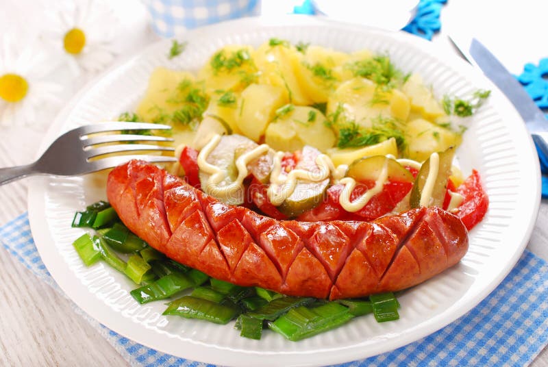 Grilled sausage,vegetable salad and potato