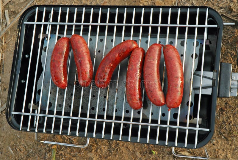 Grilled Sausages at Camp stock image. Image of grilling 580469