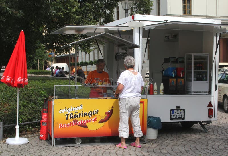 Market stand with grilled sausages, German cuisine, Weimar, Germany