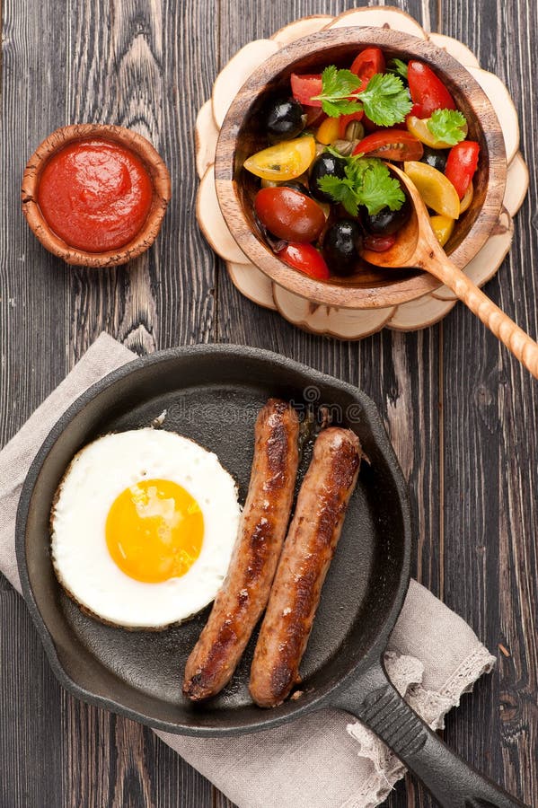 Grilled Sausages in a Frying Pan and Fried Egg Stock Photo Image of