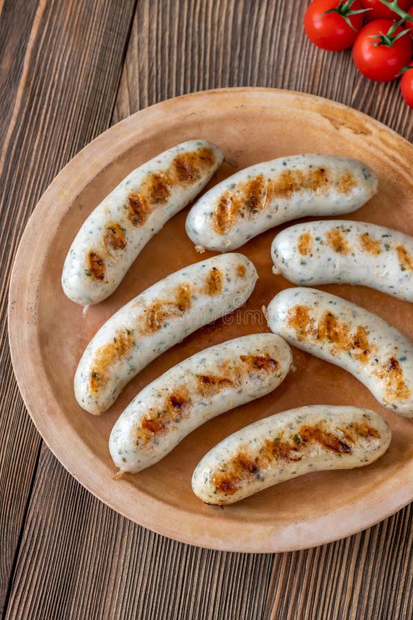 Grilled sausages on plate stock image.