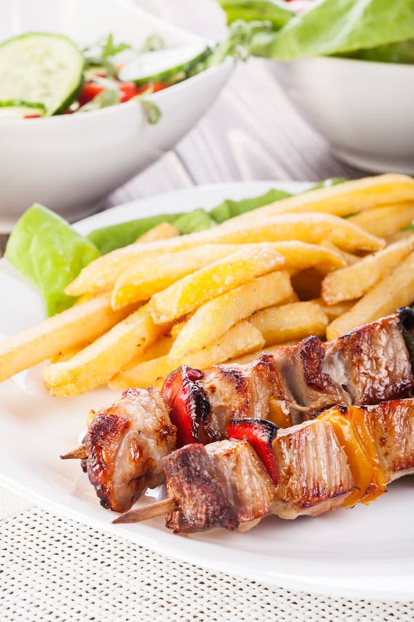 Grilled Shashlik with Chips Stock Image Image of appetizing, onion