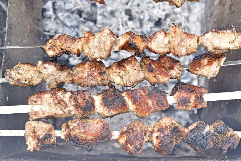 Grilled Shish Kebab on the Grill with Meat and Coals Stock Photo