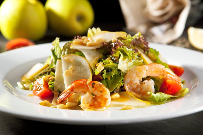 Grilled Shrimp and Pear Salad royalty free stock images