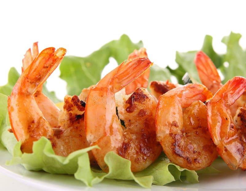 Grilled shrimp and salad royalty free stock photography