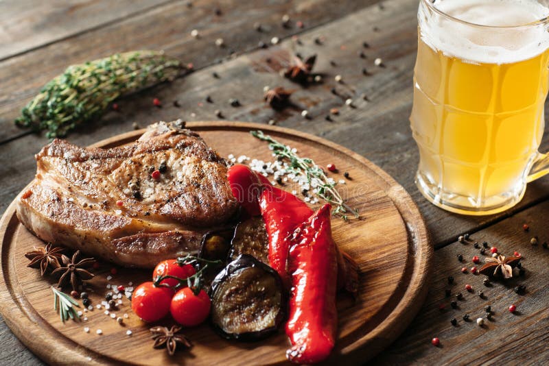 Grilled Steak and Beer on Wooden Background Stock Image - Image of ...