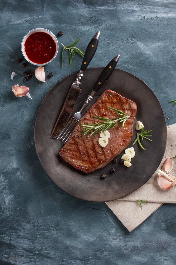 Grilled Steak with Garlic and Rosemary Stock Photo Image of