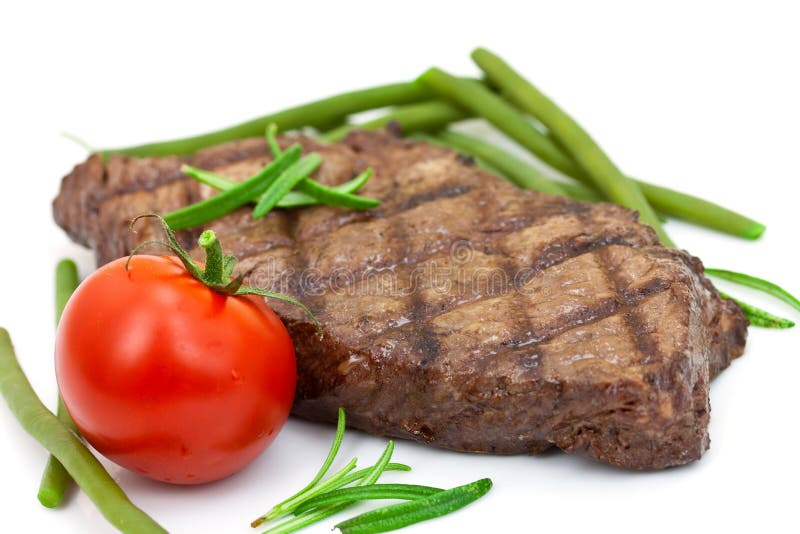 Grilled steak with tomato and green beans,isolated