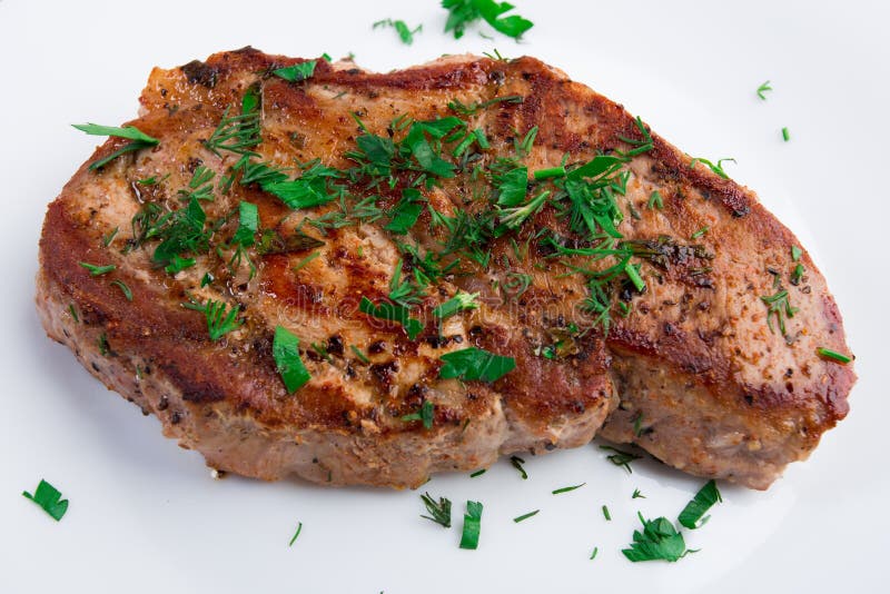 Grilled Steak on White Plate Stock Image - Image of wooden, view: 33349375